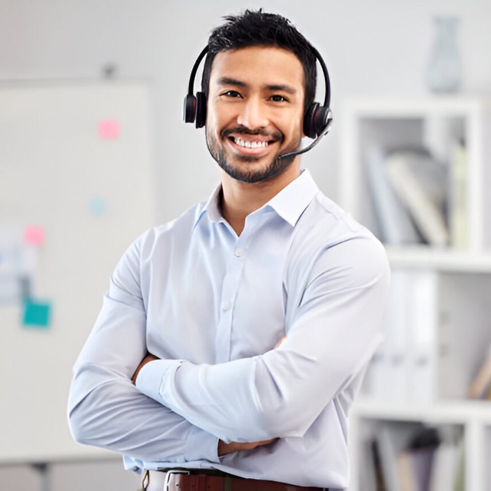 Man with headset smiling